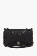 Chanel Matte Black Caviar Ruthenium Hardware Turn Around Flap Bag