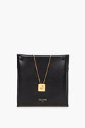 Celine Alphabet J Necklace in Brass with Gold finish